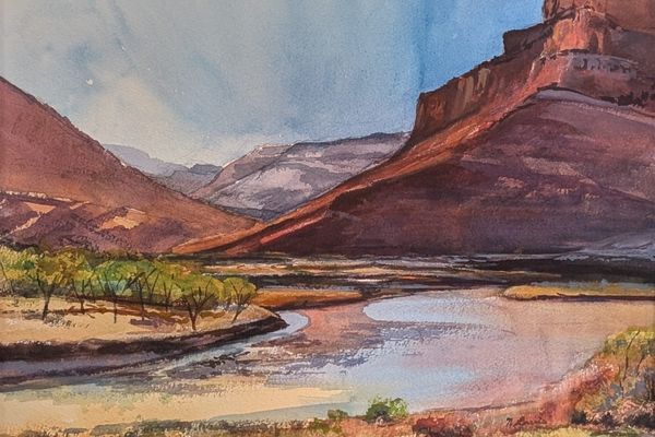 Nancy Lewis: Spring Along the Colorado River, watercolor painting of the river winding past green trees below red canyon cliffs